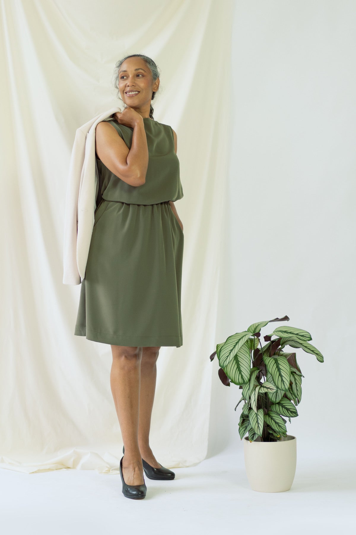 Bella | Sleeveless drapey dress in olive green